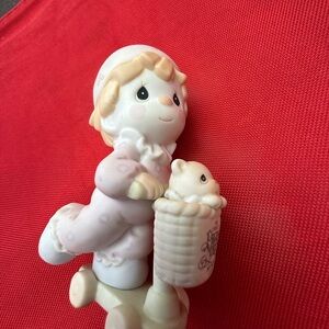 Precious Moments Figurine with Pink and Cream Accents